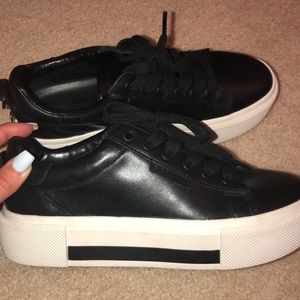Black and white platform sneakers